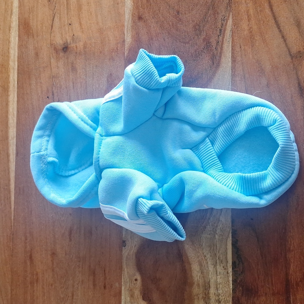 Xs pale blue dog hoodie with gift bow tie.
